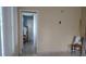 Spacious room with neutral walls, tile floors, and doorway leading to another room at 1735 Cleveland St, Clearwater, FL 33755