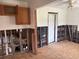 Interior view of a kitchen under renovation, featuring cabinets and exposed walls at 2011 Oakwood Ave, Tampa, FL 33605