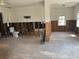 Renovation view of a living room with an exposed wall structure, needing repair at 2011 Oakwood Ave, Tampa, FL 33605