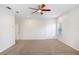 Large bedroom featuring carpet, a ceiling fan, recessed lighting, and multiple closets at 23325 Abercorn Ln, Land O Lakes, FL 34639