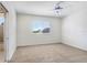 Bedroom with carpet, a ceiling fan, recessed lighting, and access to an ensuite bathroom at 23325 Abercorn Ln, Land O Lakes, FL 34639