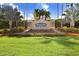 Beautiful stone sign and landscaping at the entrance to the Plantation Palms Golf Club community at 23325 Abercorn Ln, Land O Lakes, FL 34639