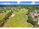Picture of the golf course with a sand trap and lush green fairways in a residential community at 23325 Abercorn Ln, Land O Lakes, FL 34639
