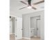 Hallway view with updated lighting at 2433 Blind Pond Ave, Lutz, FL 33549