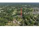 Aerial shot of a residential area featuring lush greenery and single-Gathering homes on spacious lots at 2903 Manor Ridge Pl, Valrico, FL 33596
