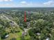 Aerial view showcasing a property in a neighborhood surrounded by lush greenery at 2903 Manor Ridge Pl, Valrico, FL 33596