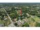 Expansive aerial view of a suburban neighborhood with mature trees and well-maintained homes at 2903 Manor Ridge Pl, Valrico, FL 33596