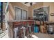 Unique outdoor bar area has custom wood finish, seating for four, and mini-fridge at 2903 Manor Ridge Pl, Valrico, FL 33596