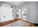 Bedroom featuring hardwood floors, a colorful rug, a closet, and nerdy décor at 2903 Manor Ridge Pl, Valrico, FL 33596