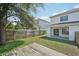 Spacious backyard with covered patio and wood deck at 307 S Arrawana Ave # 100, Tampa, FL 33609