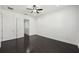 Hardwood floors highlight this bedroom with two doors and abundant light at 307 S Arrawana Ave # 100, Tampa, FL 33609