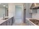 Modern kitchen boasts stainless appliances, sleek countertops, and ample storage at 3206 Lumber Falls Dr, Plant City, FL 33565