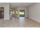 Spacious living room with tile floors and backyard access at 3206 Lumber Falls Dr, Plant City, FL 33565