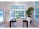 Cozy dining area with a view of the pool from the window at 35 Deerpath Dr, Oldsmar, FL 34677