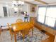 Dining area adjacent to the kitchen with a wood table and four chairs at 36901 Tara Ave, Zephyrhills, FL 33542