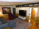 Inviting living room featuring wood floors and comfortable furniture at 36901 Tara Ave, Zephyrhills, FL 33542
