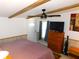 Comfortable bedroom with a ceiling fan and exterior door at 36901 Tara Ave, Zephyrhills, FL 33542
