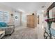 Bright entryway with a decorative rug, accent furniture, and plenty of natural light from the window at 4191 Maple Ne St, St Petersburg, FL 33703
