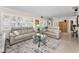 Comfortable living room with plush sofas, stylish coffee table, and bright natural light, creating a cozy atmosphere at 4191 Maple Ne St, St Petersburg, FL 33703