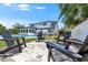 Stunning backyard with a pool, lush landscaping, and inviting seating area at 4710 Travertine Dr, Tampa, FL 33615