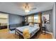 Cozy bedroom showcasing a comfortable bed, seating area, and ample natural light at 4710 Travertine Dr, Tampa, FL 33615