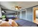 This bedroom offers a queen bed, bunk bed, large closet, and natural light at 4710 Travertine Dr, Tampa, FL 33615