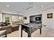 Game room features a foosball table, a dart board and comfortable seating at 4710 Travertine Dr, Tampa, FL 33615