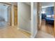 Hallway with wood floors, closet and bedroom at 4710 Travertine Dr, Tampa, FL 33615