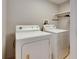 Functional laundry room equipped with a washer and dryer at 4710 Travertine Dr, Tampa, FL 33615
