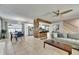 Inviting living space featuring a seamless flow between the dining area, kitchen, and living room, perfect for entertaining at 4710 Travertine Dr, Tampa, FL 33615