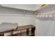Organized walk-in closet featuring shelving and rod for efficient storage at 4710 Travertine Dr, Tampa, FL 33615