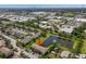 Aerial shot shows the townhome's proximity to the pond and surrounding neighborhood at 4734 67Th N Ave, Pinellas Park, FL 33781
