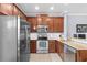 Well-equipped kitchen with stainless steel appliances and ample cabinet space at 4734 67Th N Ave, Pinellas Park, FL 33781
