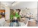 View of the living space from the dining table showcasing a seamless flow from kitchen to living room at 5127 6Th N Way, St Petersburg, FL 33703