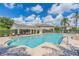 The beautiful community pool area includes lounge chairs, a spa, and plenty of room to relax at 5127 6Th N Way, St Petersburg, FL 33703
