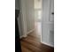 Hallway view showing updated flooring and freshly painted neutral walls at 6025 Osprey Lake Cir, Riverview, FL 33578