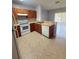 Efficient kitchen features modern appliances, tile floors and ample counterspace at 6025 Osprey Lake Cir, Riverview, FL 33578