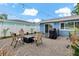 Cozy backyard with patio and outdoor seating, perfect for entertaining or relaxing at 6471 109Th N Ter, Pinellas Park, FL 33782