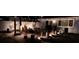 Backyard patio area with outdoor seating and string lights, creating a warm and inviting ambiance at 6471 109Th N Ter, Pinellas Park, FL 33782