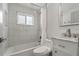 Well-lit bathroom featuring modern fixtures and shower with bright tile at 6471 109Th N Ter, Pinellas Park, FL 33782