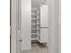 Organized closet with custom shelving, maximizing storage space in a well-lit area at 6471 109Th N Ter, Pinellas Park, FL 33782