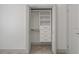 Open closet with white built-in shelving and drawers at 6471 109Th N Ter, Pinellas Park, FL 33782