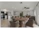 Spacious living room with a cozy dining area, creating an inviting atmosphere for Gathering and guests at 6471 109Th N Ter, Pinellas Park, FL 33782