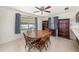 Cozy dining area with backyard view, perfect for Gathering meals and entertaining at 6520 Meadowbrook Ln, New Port Richey, FL 34653