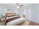 Comfortable bedroom with a bed, and sliding door access to a yard with a shed at 7318 Lamplighter St, Spring Hill, FL 34606