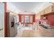 Bright kitchen with stainless steel appliances, and a bay window eating area at 7318 Lamplighter St, Spring Hill, FL 34606