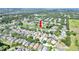 Aerial view of homes in neighborhood with pond and easy access to other neighborhoods in the city at 7855 Bristol Park Dr., Apollo Beach, FL 33572