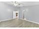 Bedroom with light grey walls, tile flooring and views of other rooms at 7855 Bristol Park Dr., Apollo Beach, FL 33572