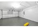 Spacious garage with overhead lighting and storage capability at 7855 Bristol Park Dr., Apollo Beach, FL 33572