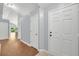 Inviting foyer with wood floors, light gray walls, and ample natural light at 7855 Bristol Park Dr., Apollo Beach, FL 33572
